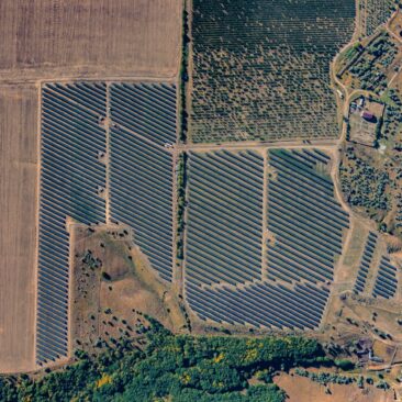 Aerial view of a large solar panel farm.